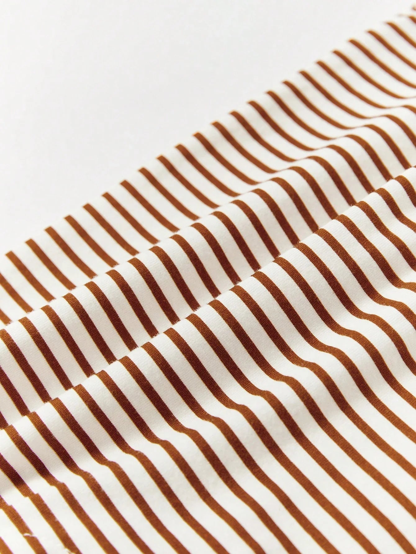 Macacão Listrado Com Bolso