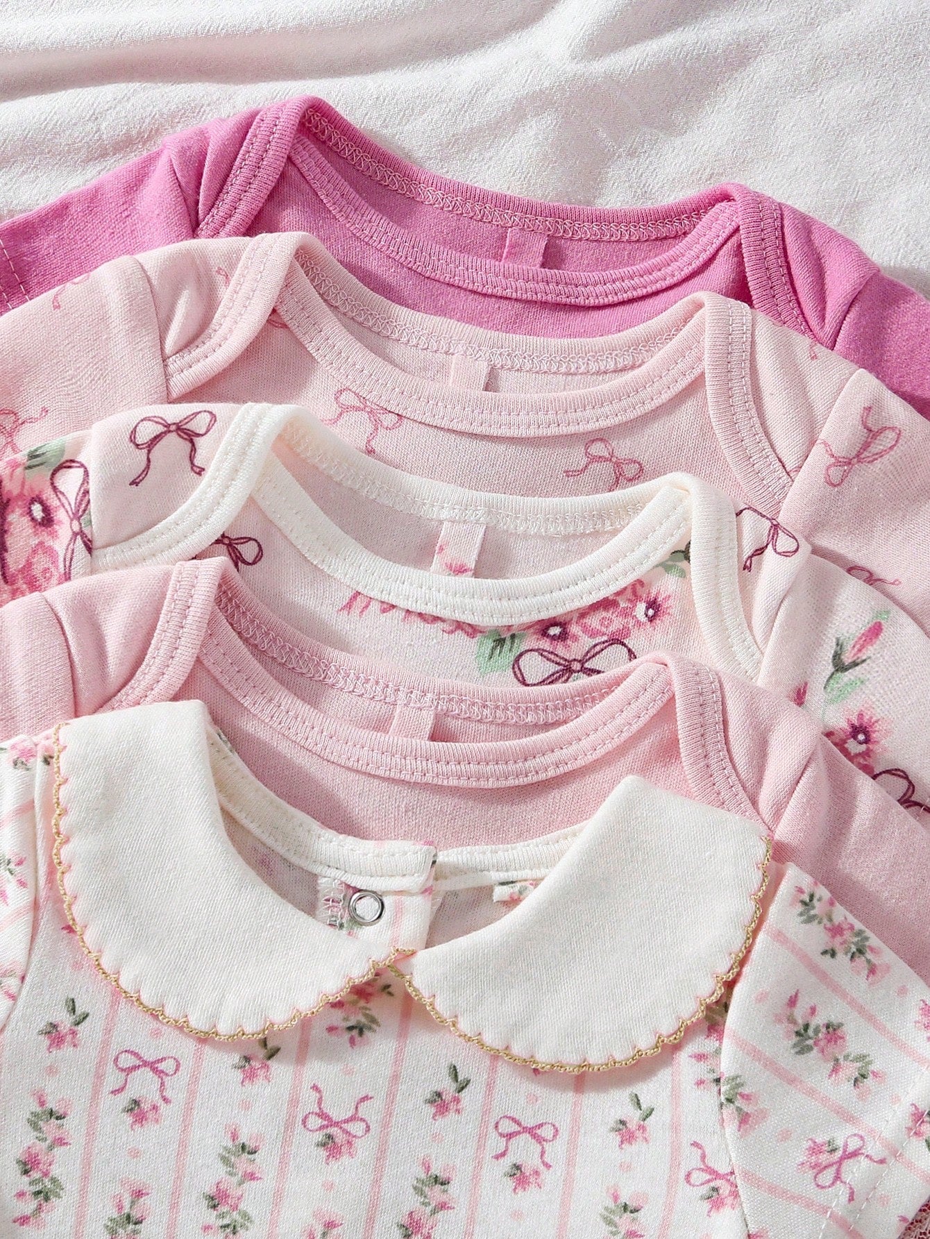 Kit body bebê 5 peças Tons de Rosa